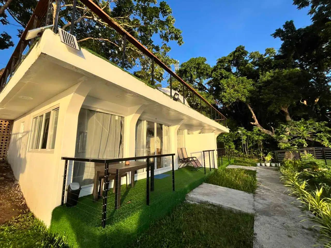 A private terrace overlooking the Bohol Sea at Txaleta de Camiguin